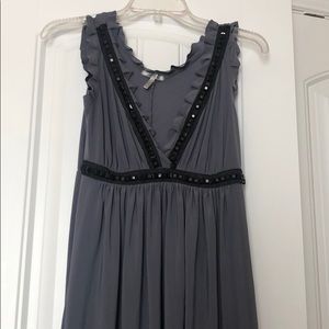 They dress with black accents